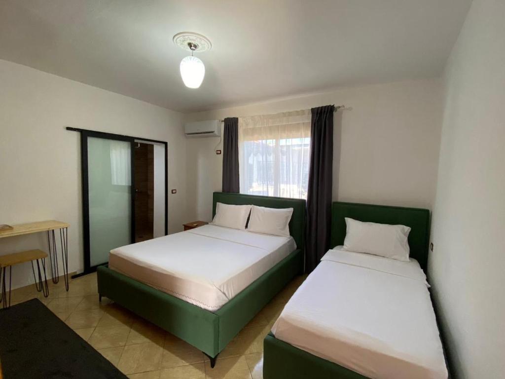 Postel nebo postele na pokoji v ubytování Vavla House