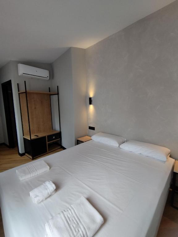 Postel nebo postele na pokoji v ubytování Sweet Sevilla Hostel