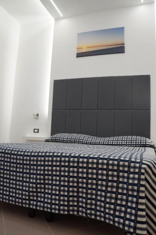 Postel nebo postele na pokoji v ubytování Hotel Parco Carabella
