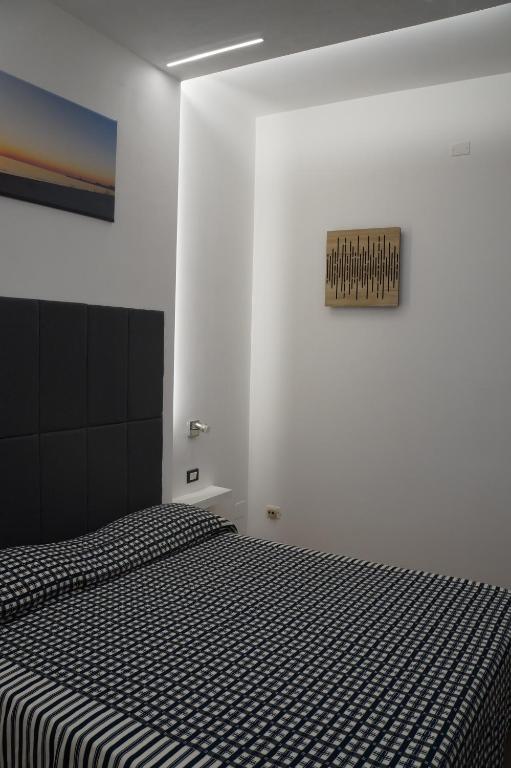 Postel nebo postele na pokoji v ubytování Hotel Parco Carabella