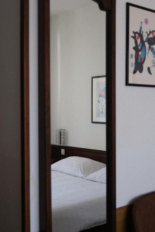 Cama o camas de una habitación en Hotel Besso Lugano Center