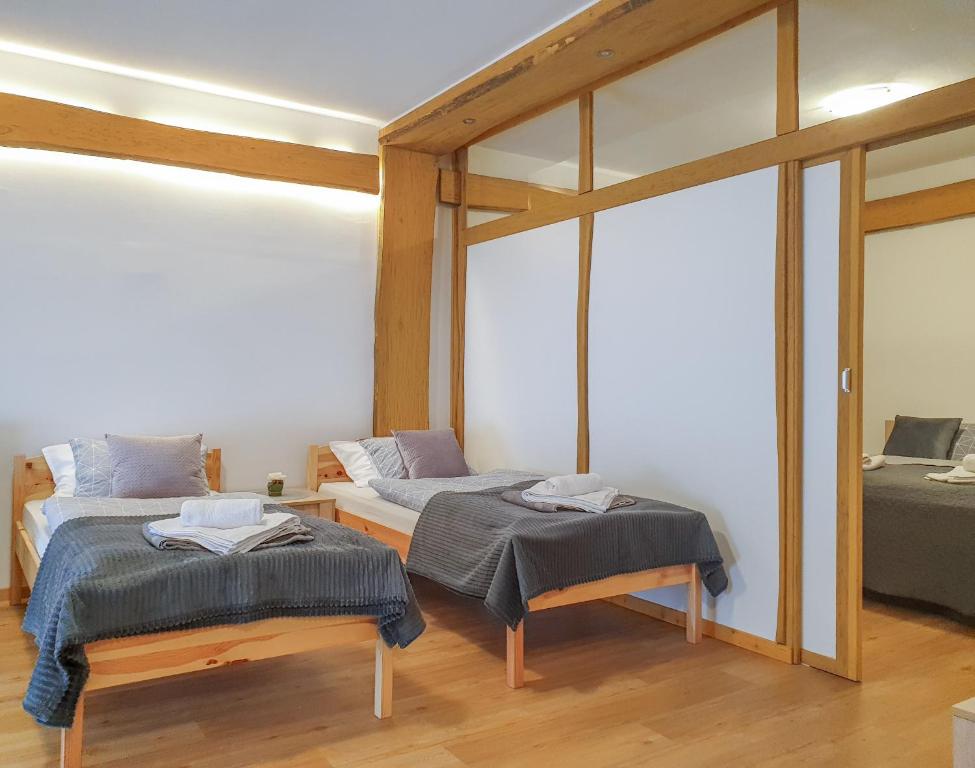 Postel nebo postele na pokoji v ubytování Apartment Feher Lendava