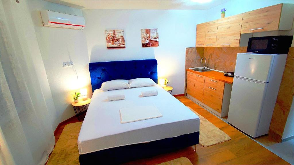 Dapur atau dapur kecil di Apartman Seno