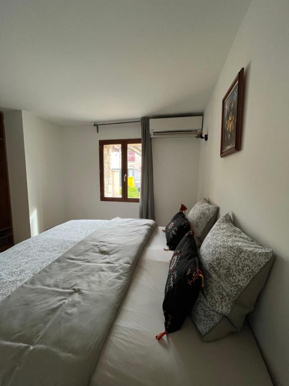Posteľ alebo postele v izbe v ubytovaní Maison familiale 3 chambres, parking gratuit