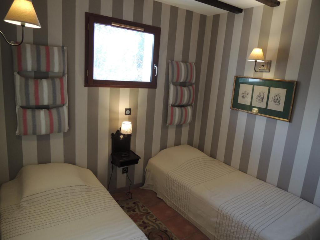Postel nebo postele na pokoji v ubytování Via Bahia - Maison d'hôtes