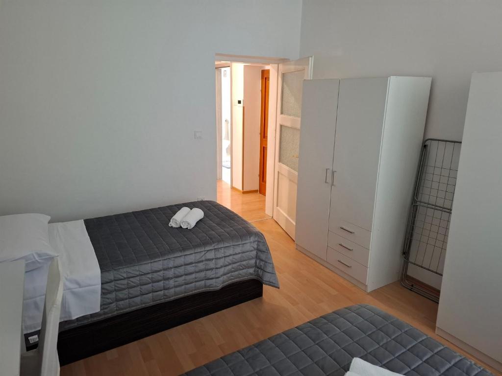 Postel nebo postele na pokoji v ubytování Barka Zadar