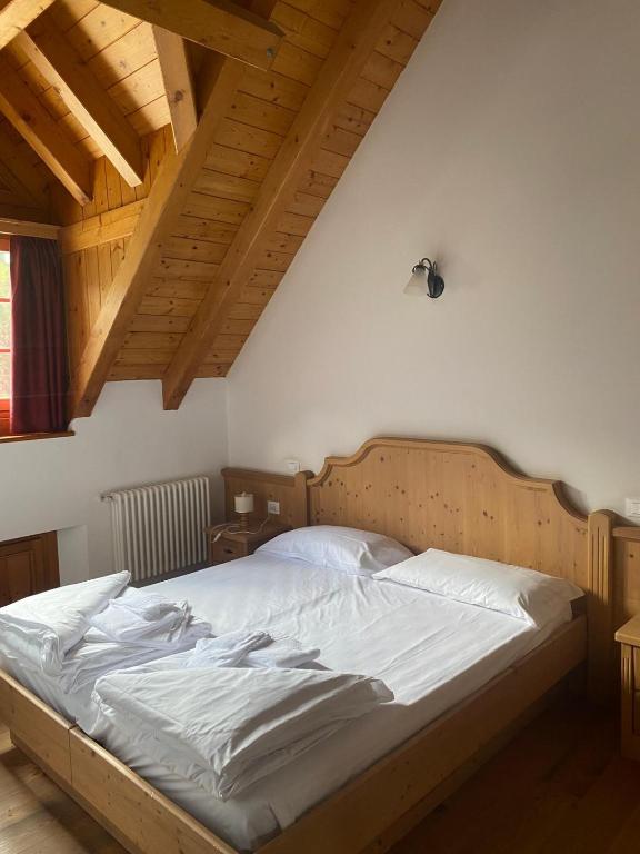 Postel nebo postele na pokoji v ubytování Hotel Aplis