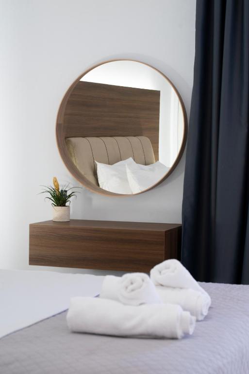 Postel nebo postele na pokoji v ubytování MY PHOS Boutique Apartments