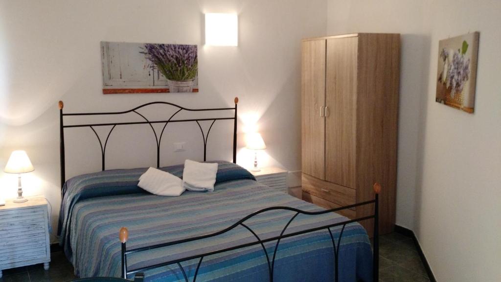 Postel nebo postele na pokoji v ubytování The 5 Terre