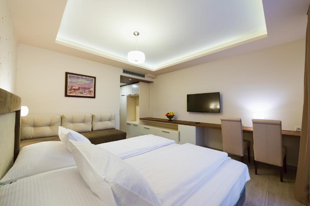 Postel nebo postele na pokoji v ubytování Hotel Borkovac
