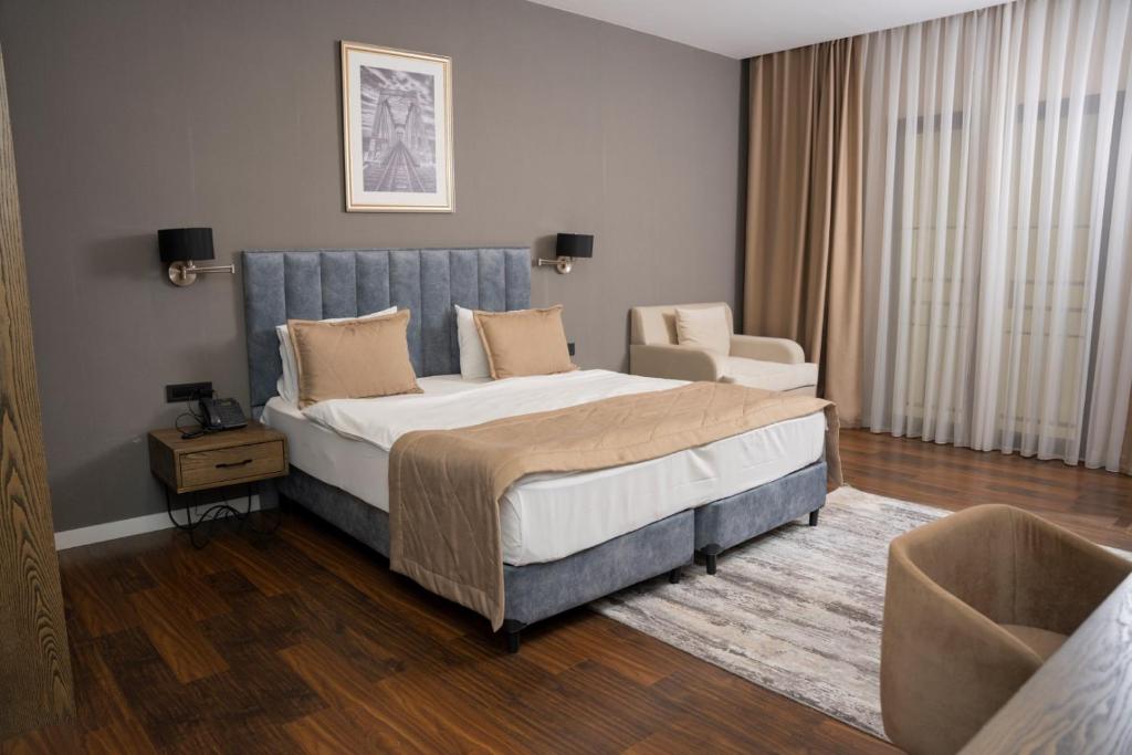 Postel nebo postele na pokoji v ubytování Port Rivoli Hotel Baku