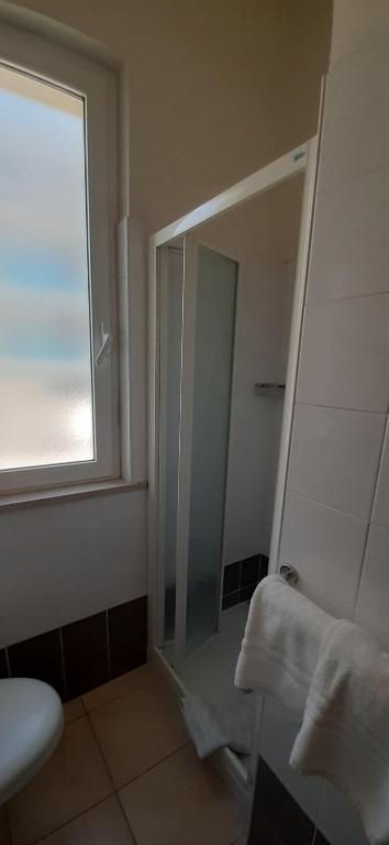 Koupelna v ubytování Hotel Belmar