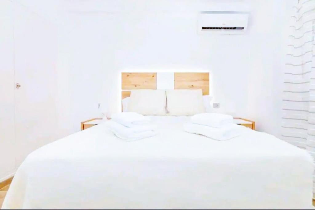 Posteľ alebo postele v izbe v ubytovaní Apartamento Puerto Sol y Mar