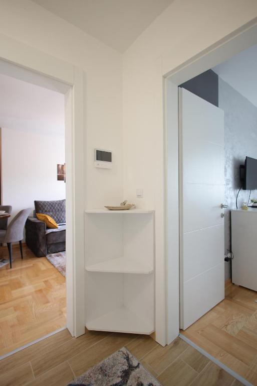 TV a/nebo společenská místnost v ubytování Apartman Zivic