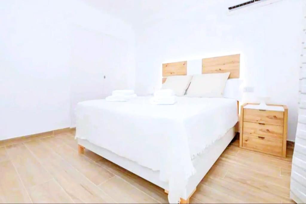 Posteľ alebo postele v izbe v ubytovaní Apartamento Puerto Sol y Mar
