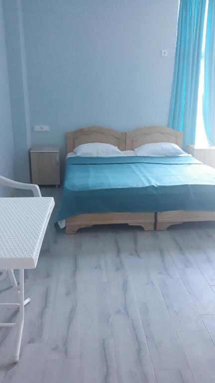 Postel nebo postele na pokoji v ubytování Hotel Marinus