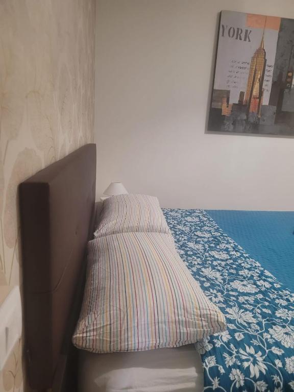 Posteľ alebo postele v izbe v ubytovaní Tiny Green apartament in Rome - Magliana