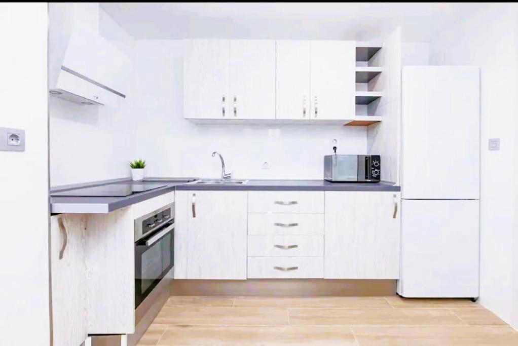 Kuchyňa alebo kuchynka v ubytovaní Apartamento Puerto Sol y Mar