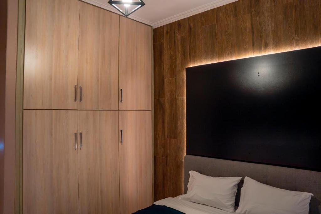 Posteľ alebo postele v izbe v ubytovaní Kondoulis House 2