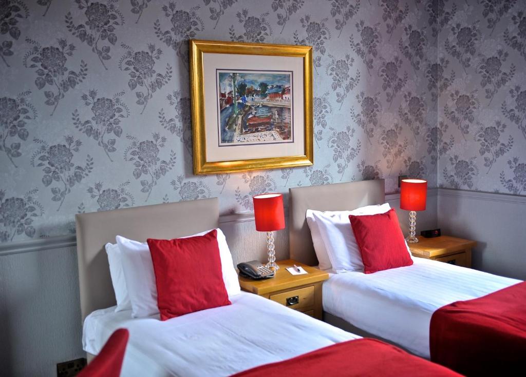 Postel nebo postele na pokoji v ubytování Braid Hills Hotel