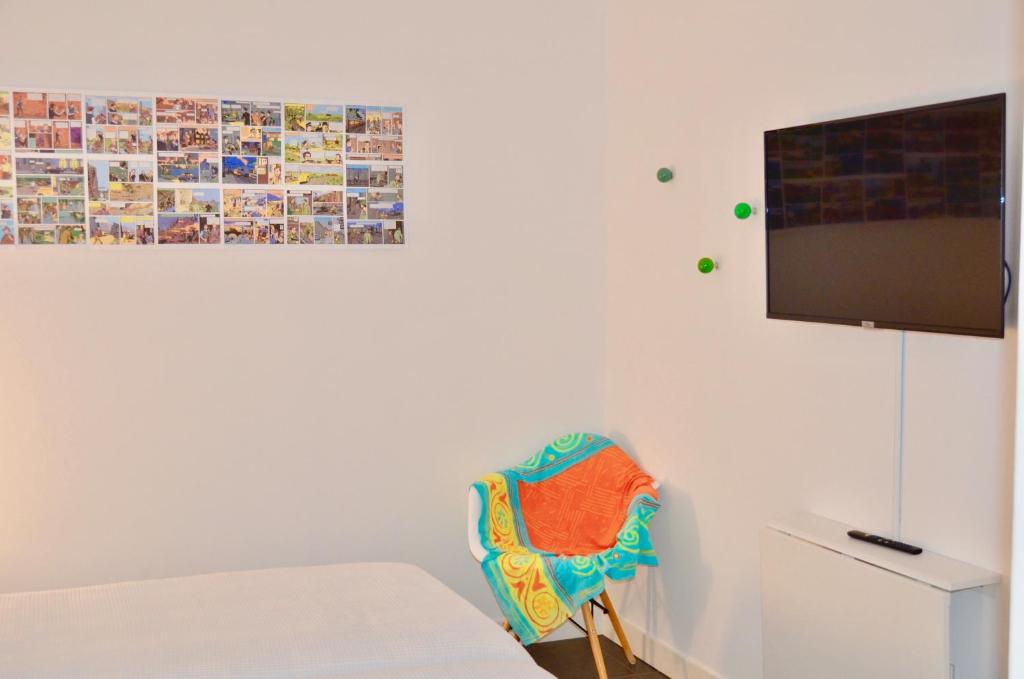 TV a/nebo společenská místnost v ubytování CASA UMA