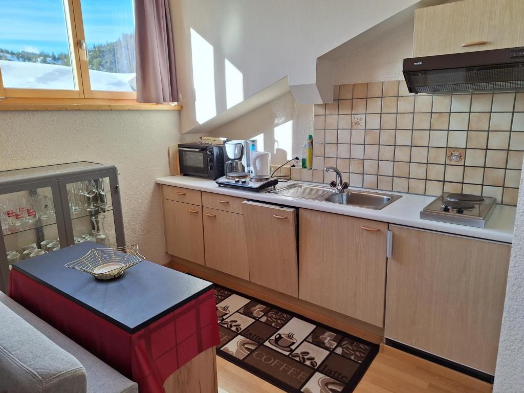 Kuchyň nebo kuchyňský kout v ubytování Ferienwohnungen Walserhof Malbun