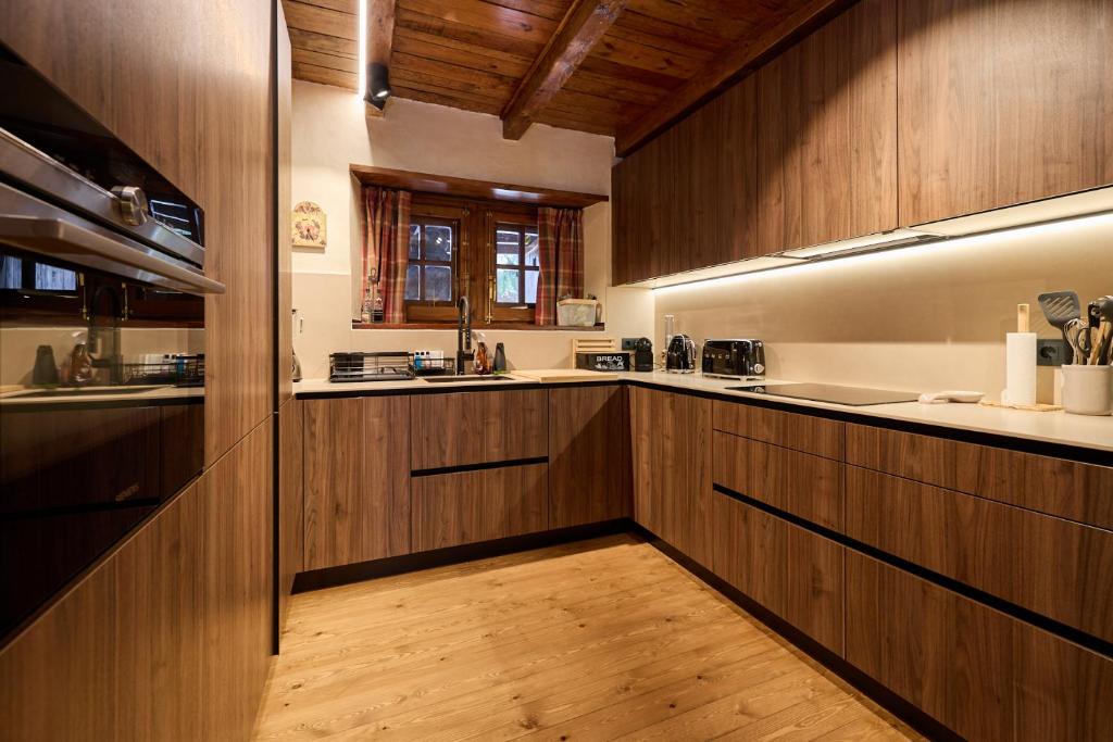 Kuchyň nebo kuchyňský kout v ubytování Pleta del Tarter 31A Lodge & SPA