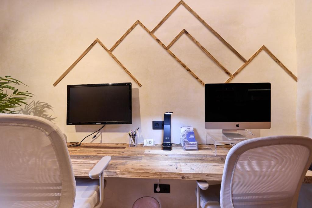 TV a/nebo společenská místnost v ubytování Pleta del Tarter 31A Lodge & SPA