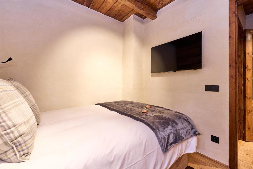 Postel nebo postele na pokoji v ubytování Pleta del Tarter 31A Lodge & SPA