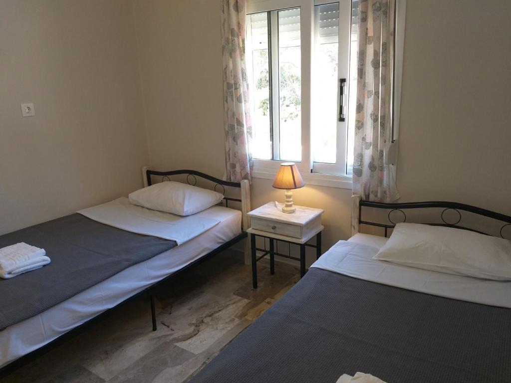 Postel nebo postele na pokoji v ubytování Skala Central House