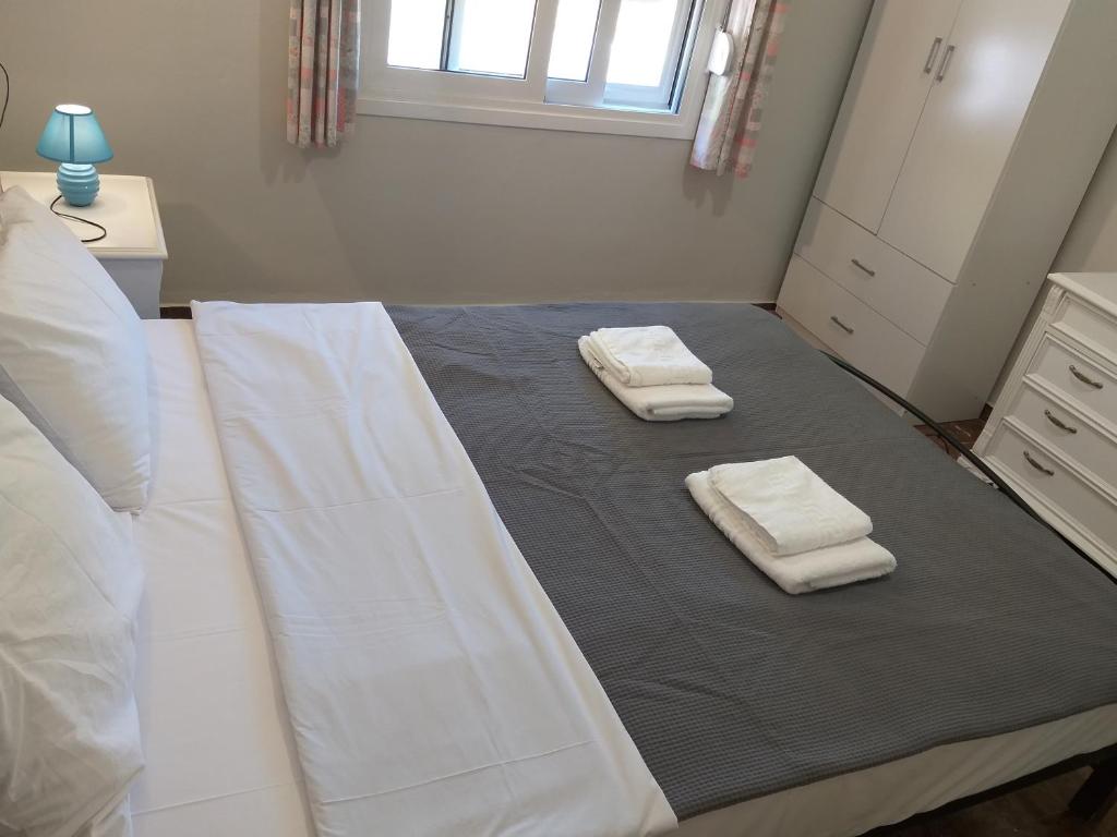 Postel nebo postele na pokoji v ubytování Skala Central House