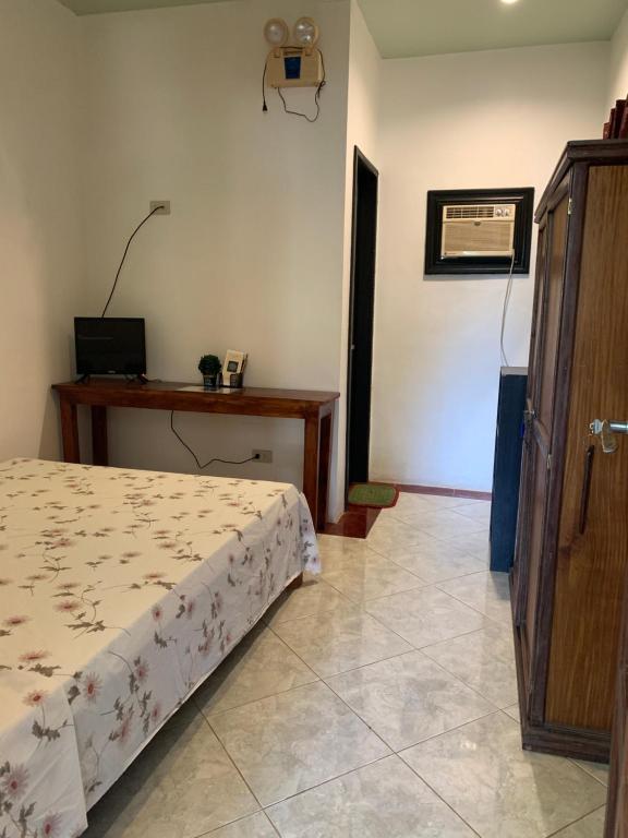 Postel nebo postele na pokoji v ubytování LS Garden Villa