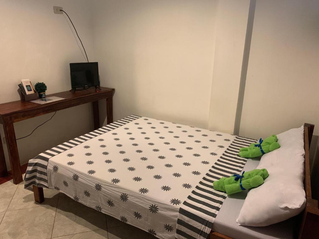 Postel nebo postele na pokoji v ubytování LS Garden Villa