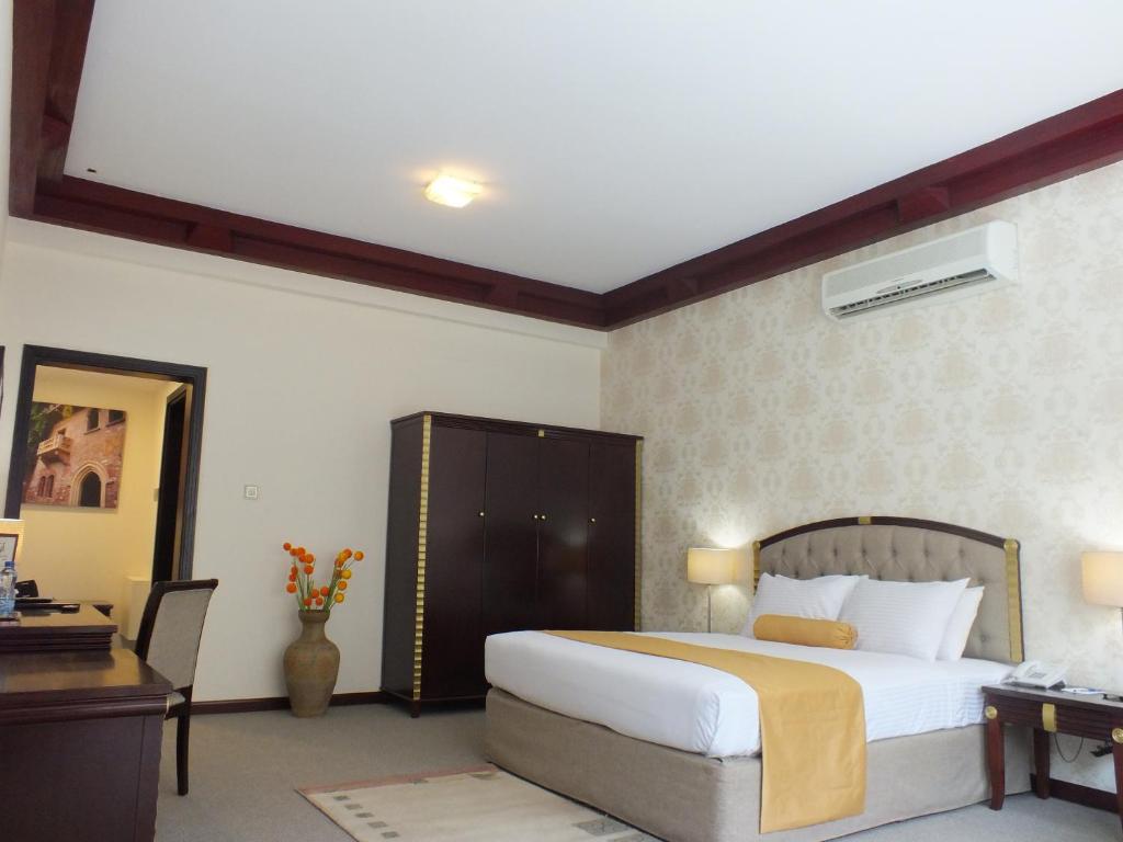 Postel nebo postele na pokoji v ubytování Verona Resorts Sharjah