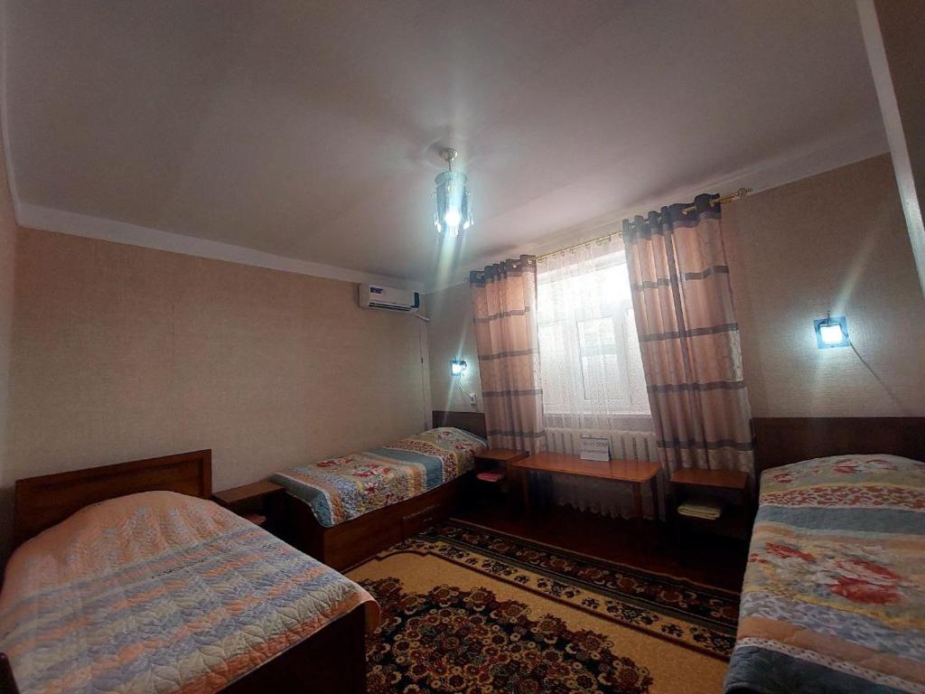 NUKUS GUEST HOUSE - Klassischer Dreifachzimmer