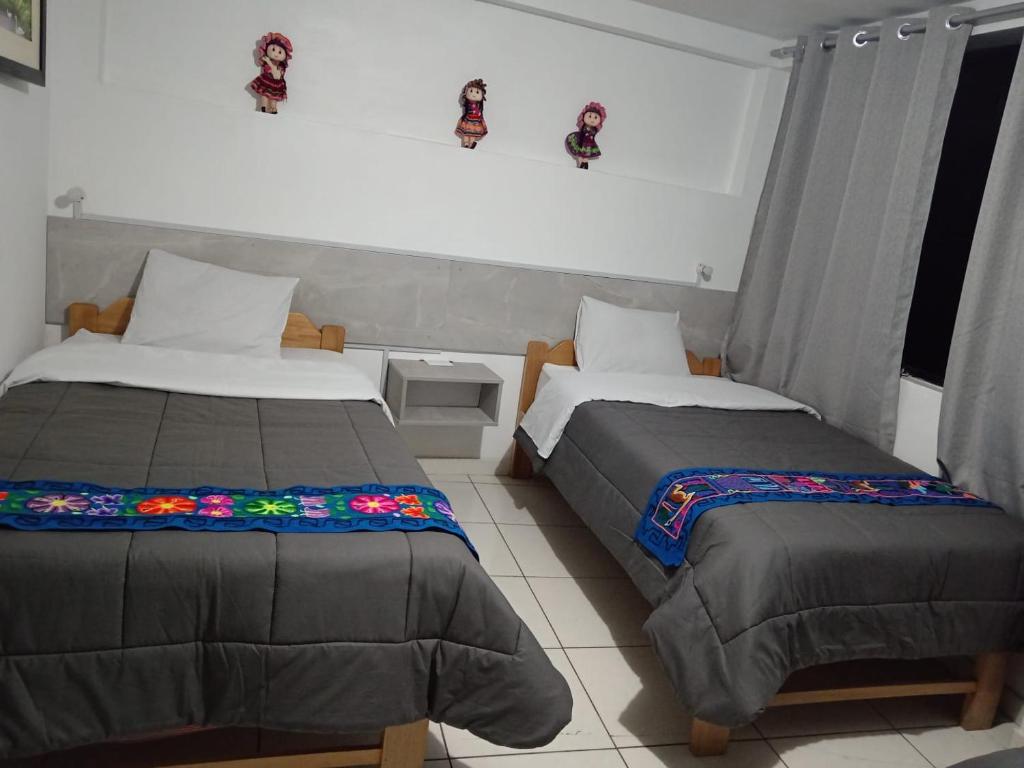 Katil atau katil-katil dalam bilik di HOSTAL La RASA