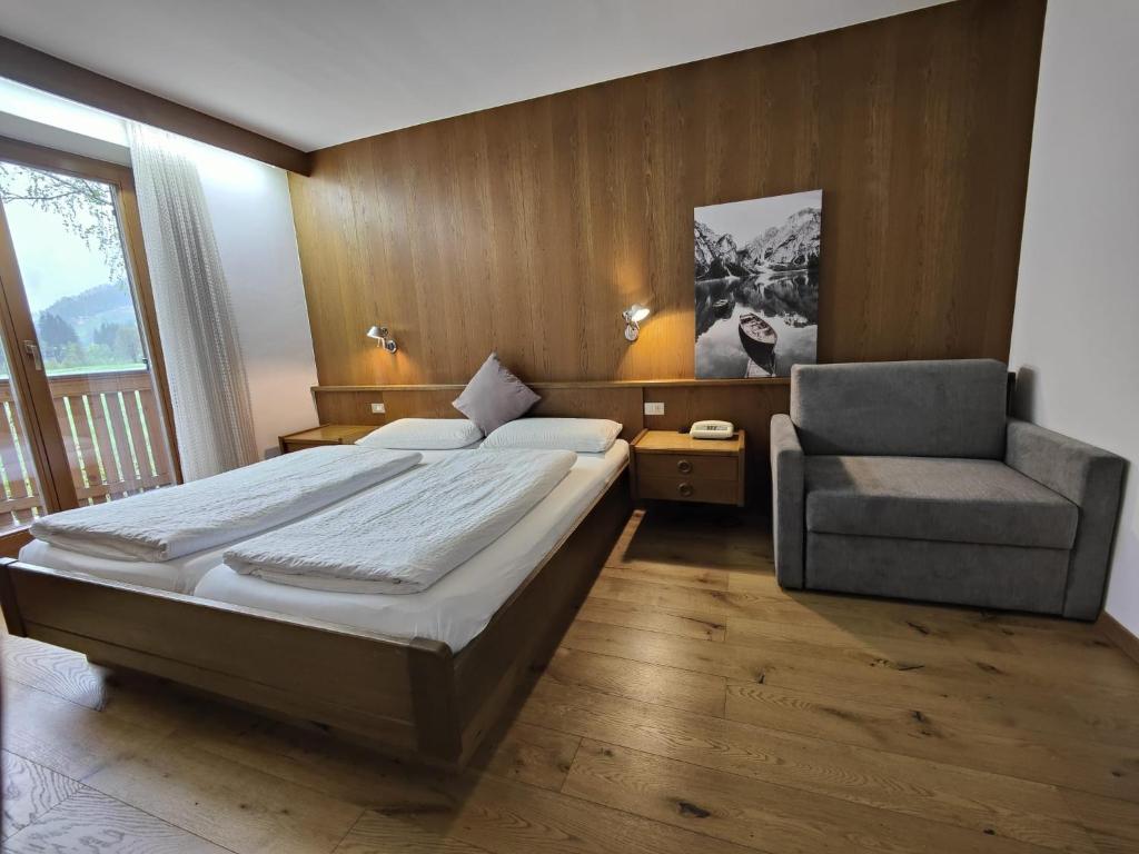 Postel nebo postele na pokoji v ubytování Hotel Alpenblick