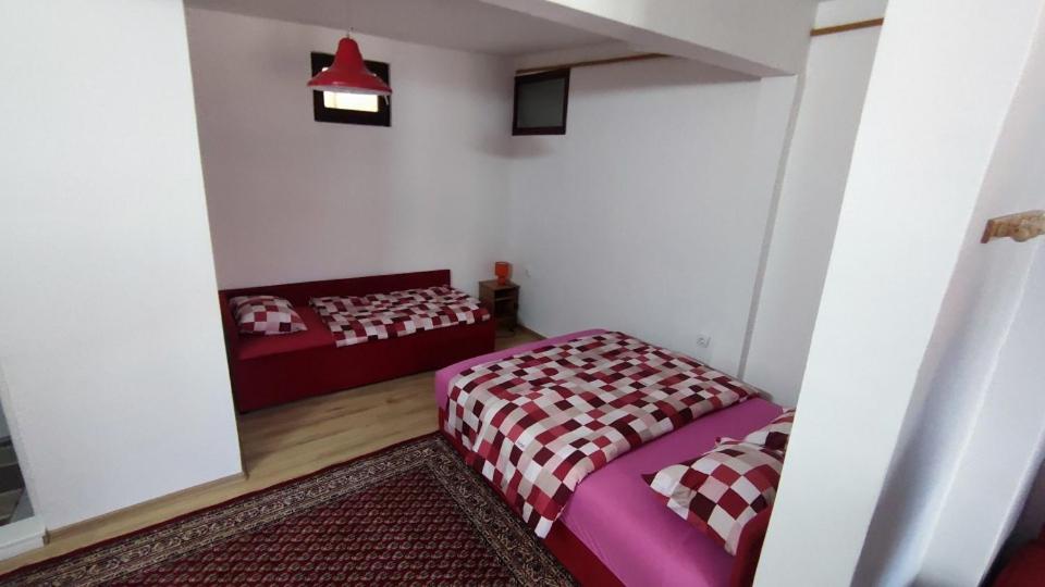 Posteľ alebo postele v izbe v ubytovaní Apartments Dino