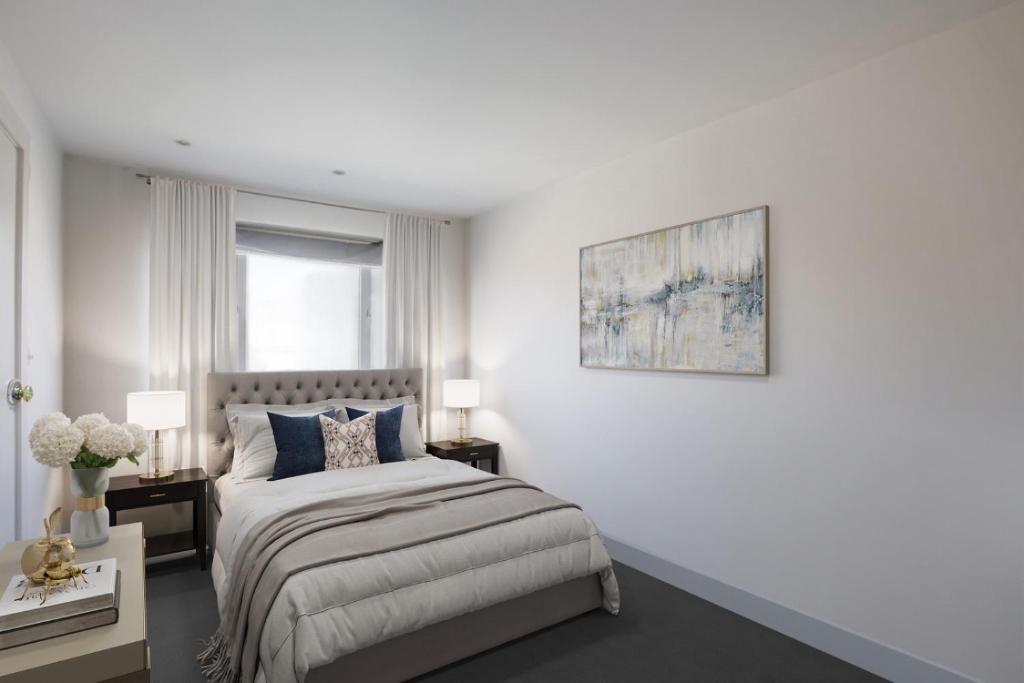 a white bedroom with a bed and a window at Comfy 2 Bedrooms by Natural History Museum in London