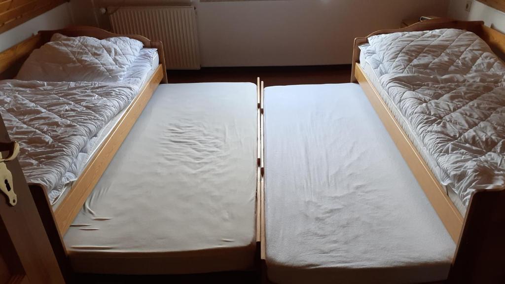 Postel nebo postele na pokoji v ubytování Ferienwohnung Hähnlein