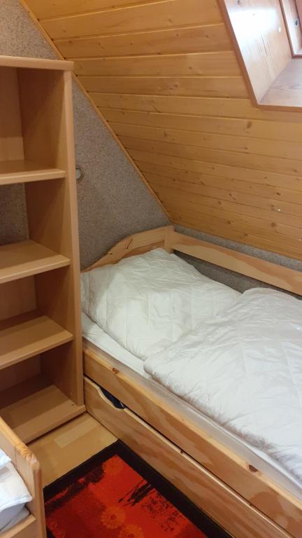 Postel nebo postele na pokoji v ubytování Ferienwohnung Hähnlein