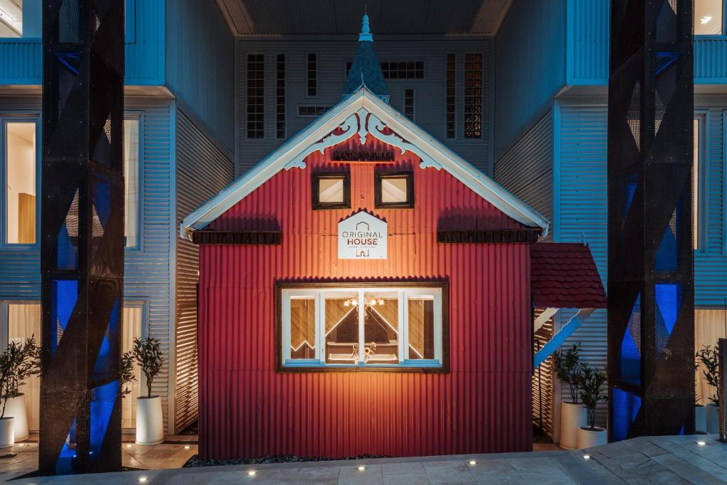 a gingerbread house in the middle of a building at Original House Hotel Boutique in Ushuaia