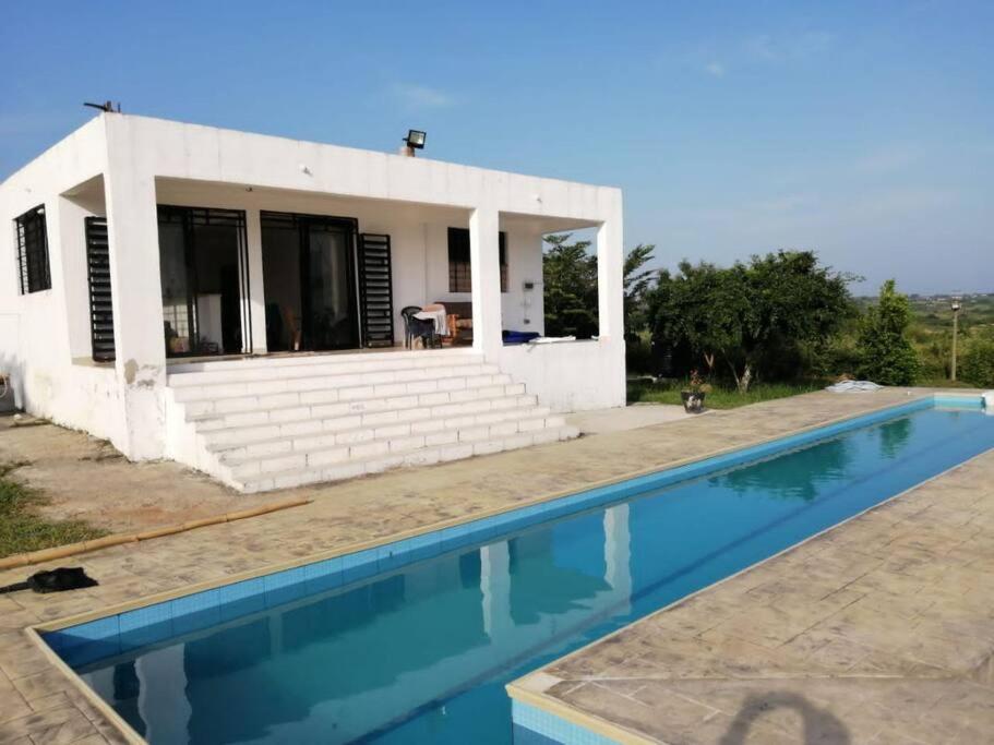 The swimming pool at or close to 3 bedroom vacation house with large pool