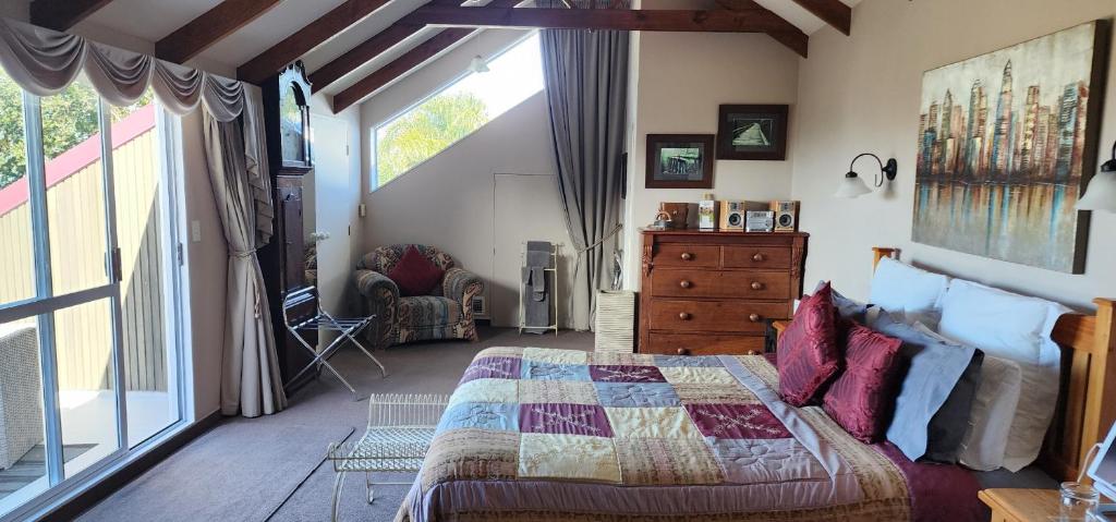 Postel nebo postele na pokoji v ubytování MnM's BnB