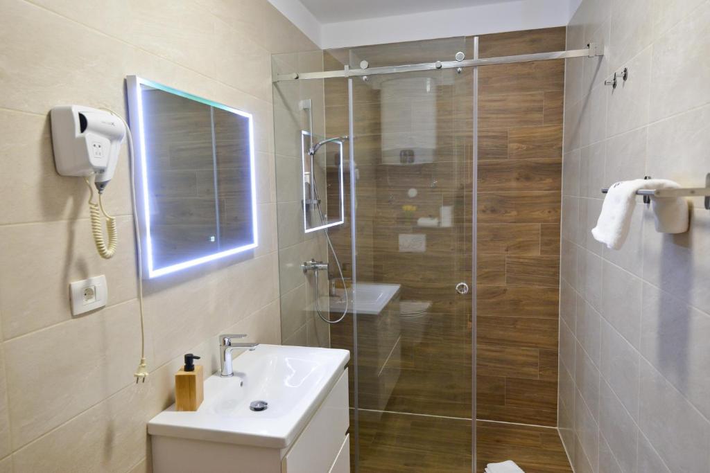Koupelna v ubytování Zoilo Rooms self check-in