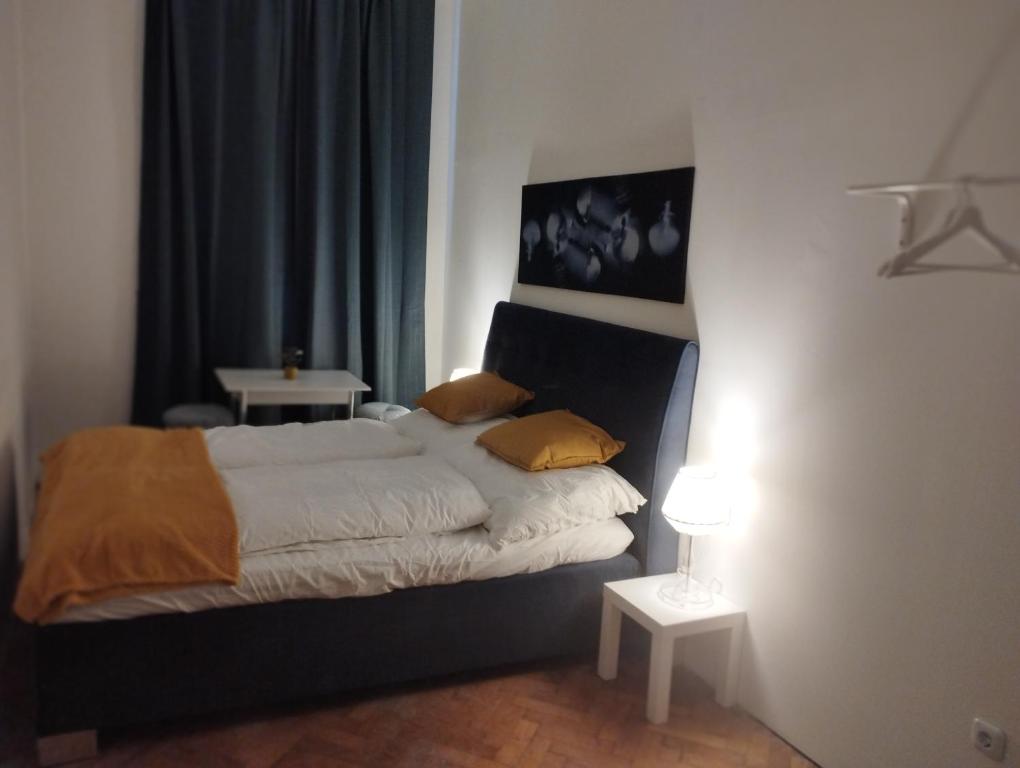 Ένα ή περισσότερα κρεβάτια σε δωμάτιο στο RP-Stay