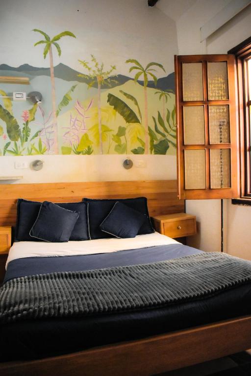 Postel nebo postele na pokoji v ubytování Usaquen Station Hostel