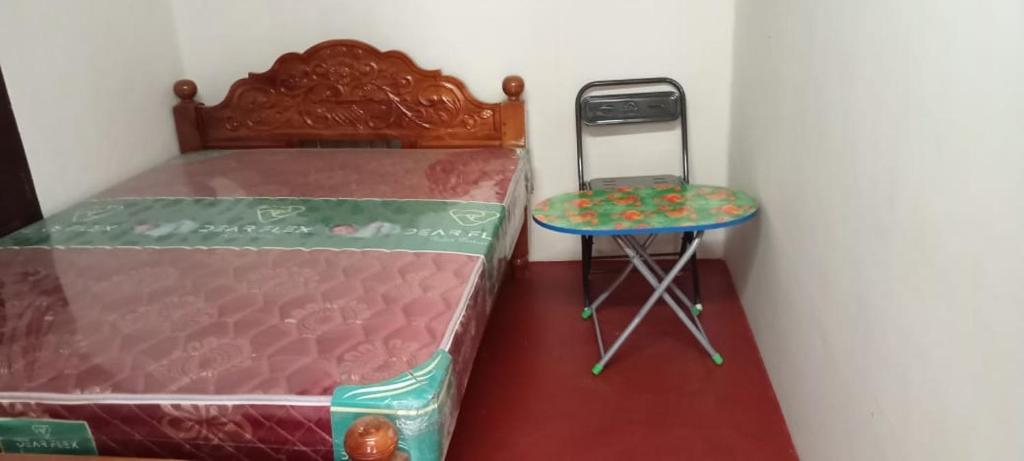 Postel nebo postele na pokoji v ubytování Hallima Residency Non Ac