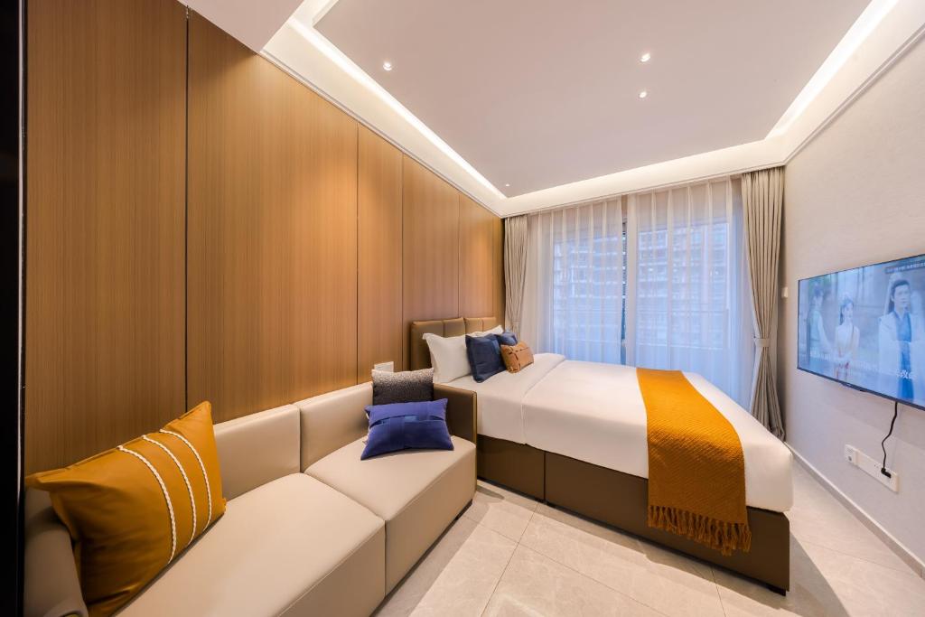 Posezení v ubytování Xi Ke Executive Apartment - Shenzhen Futian Exhibition Center
