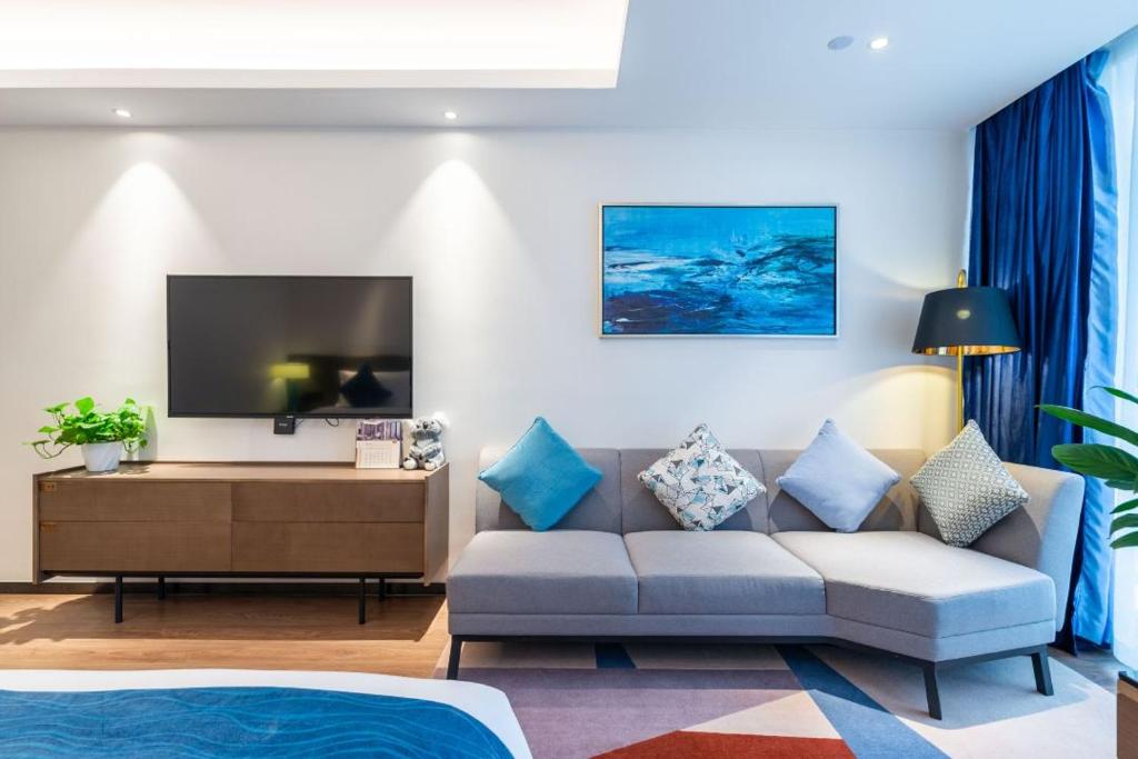 TV a/nebo společenská místnost v ubytování Changsha Zealandia Serviced Apartment